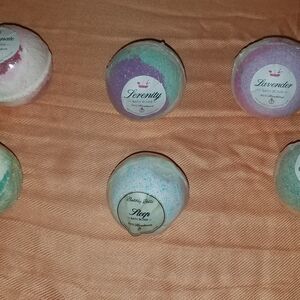 Bubbly Belle Bath Bombs with rings size 7 inside $75 for all or $15 for one.